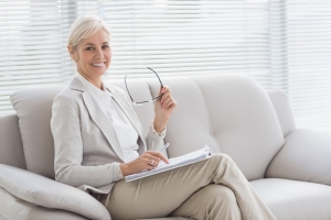 lady wearing suit smiling